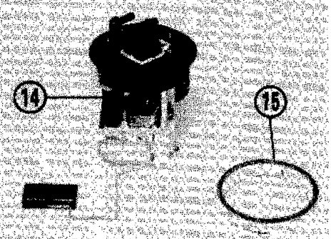 Diagram showing ring nut (13), tray (14), and seal (15) removed from the fuel tank opening