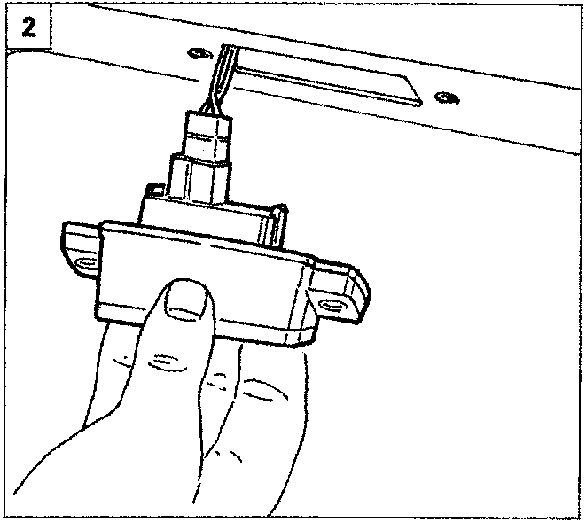 Diagram showing a hand disconnecting the wiring connector from the removed number plate light unit