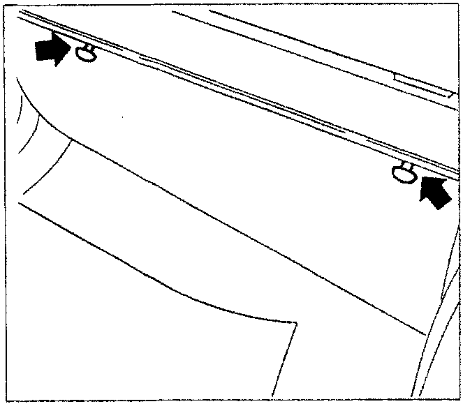 Diagram showing the trim beneath the glove compartment with two studs indicated by arrows