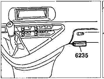 Close-up view of the central console area showing a connector labeled 6235 and a plug labeled CT9