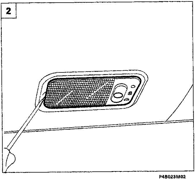 Diagram showing a tool prying off the courtesy light cover
