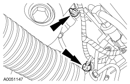 Step 34: Disconnect the engine wiring harness retainers from the A/C compressor.