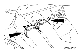 Step 19: Disconnect the heater hoses.