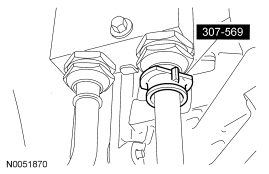 Step 35: Using the special tool, disconnect the transaxle cooling tubes.