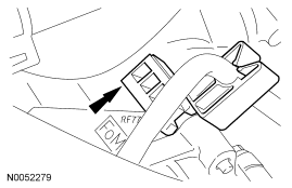 Step 24: Disconnect the fuel hose routing clip from the transaxle stud and position the fuel hose aside.