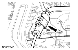 Step 77: Disconnect the RH catalyst monitor electrical connector.