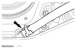 Step 6: Disconnect the power steering cooler hose and drain the power steering fluid into a suitable drain pan.