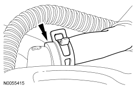 Step 13: Disconnect the vacuum hose from the upper intake manifold.