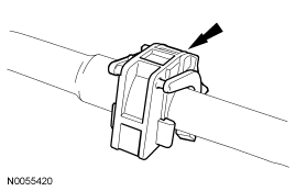 Step 21: Remove the safety clip from the A/C fitting.