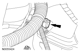 Step 27: Detach the wiring harness retainer from the RH valve cover stud bolt.