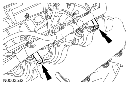 Step 14: Disconnect the 2 engine wiring harness retainers from the LH valve cover studs.