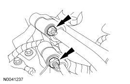 Step 24: Remove the 2 nuts and disconnect the A/C tubes.