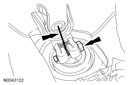 Step 39: Remove the bolt and disconnect the steering column shaft from the steering gear.