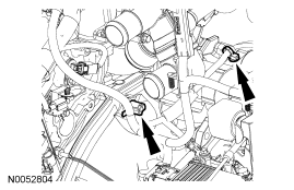 Step 79: Disconnect the wiring harness fasteners from the transaxle-to-engine stud bolt and the starter.