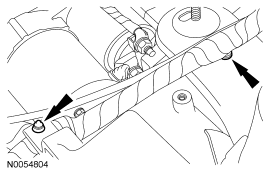 Step 11: Detach the 2 wiring harness retainers from the transmission mount and the battery tray bracket.