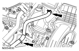 Step 29: Disconnect the hose from the power steering reservoir.