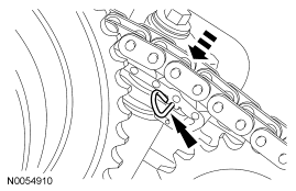 Step 1: Compress the LH secondary timing chain tensioner and install a suitable lockpin to retain the tensioner in the c