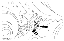 Step 1: Compress the RH secondary timing chain tensioner and install a suitable lockpin to retain the tensioner in the c