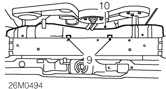 Radiator – Loosen clip and disconnect top hose from radiator.
