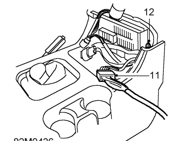Wiring harness - supplementary – Remove 4 screws securing fusebox cover to centre console.