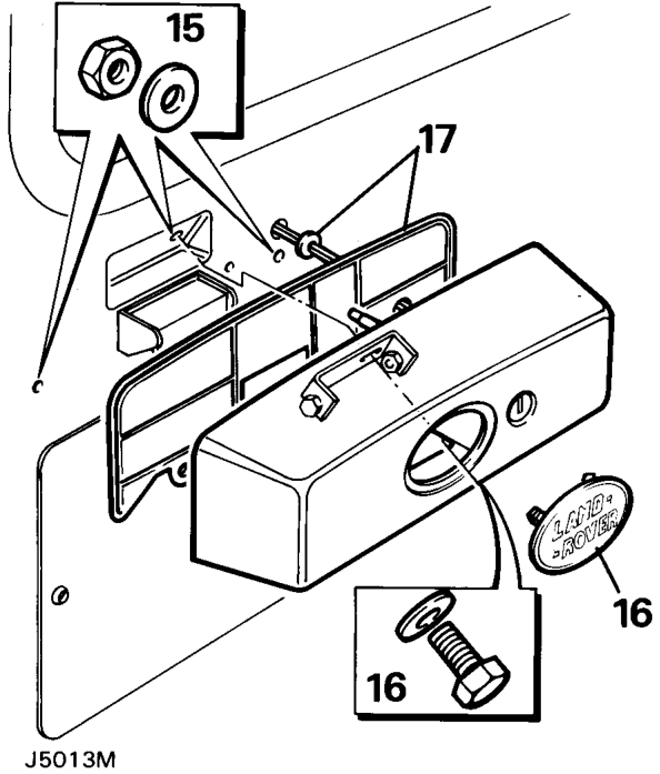 Partially withdraw the housing and its rubber seal from the door, displace the rubber grom