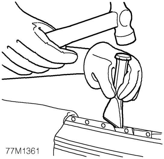 Cut away the bulk of the panel as necessary using an air saw. NOTE: On certain panel joint