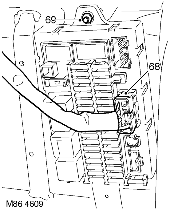 With assistance withdraw LH side harness into interior.