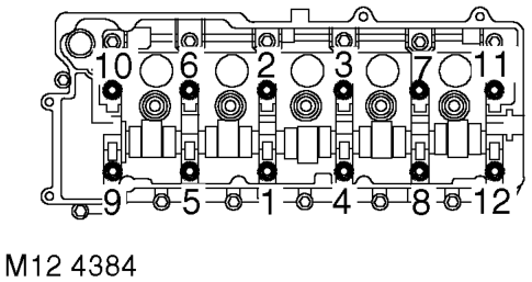 Carefully enter cylinder head bolts, DO NOT DROP. Lightly tighten bolts.