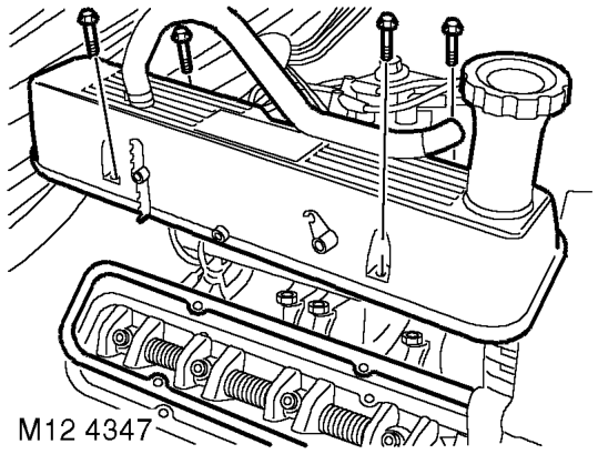Release ht leads from clips on rocker cover.