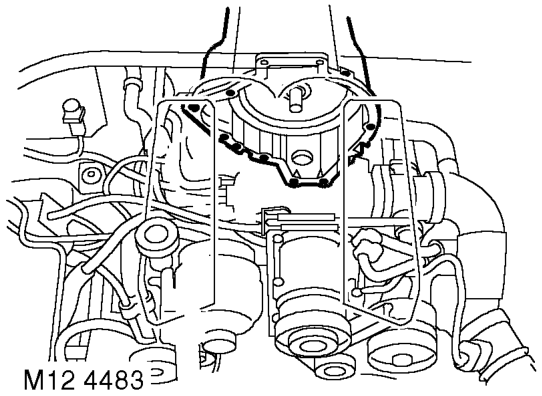 Rotate engine to access bolts.