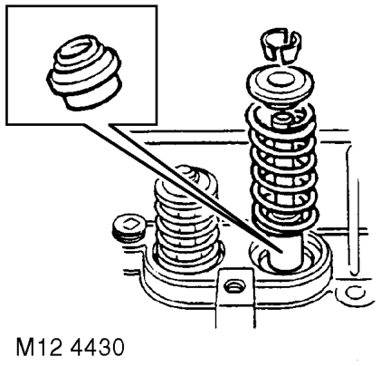Disassembly – Fit tool LRT-12-034 to valve and tighten screw to compress valve spring sufficiently to re