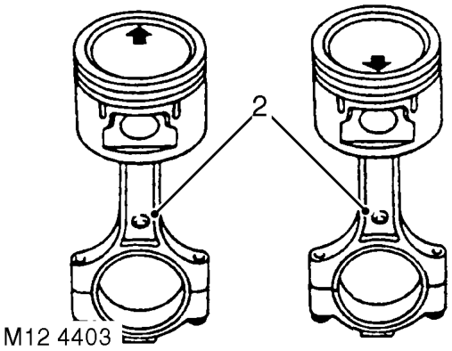 Pistons have a 5 mm (0.2 in) offset gudgeon pin which can be identified by an arrow mark o