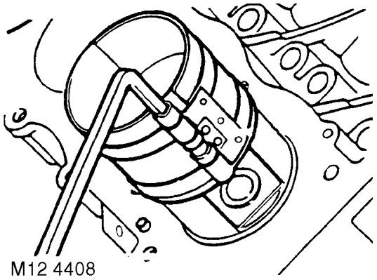 Lubricate cylinder bore with clean engine oil.