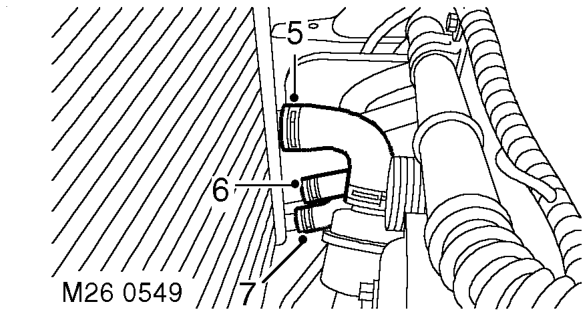 Radiator – Release clip and disconnect top hose from radiator.