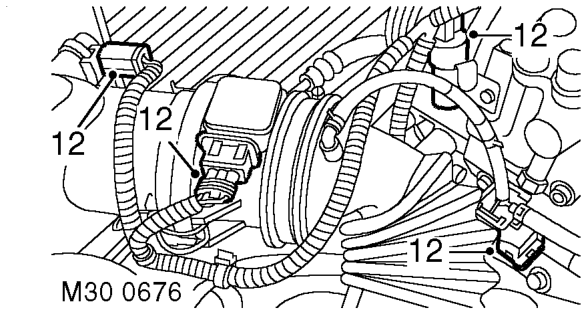 Remove 2 nuts and 8 bolts securing inlet manifold to cylinder head.