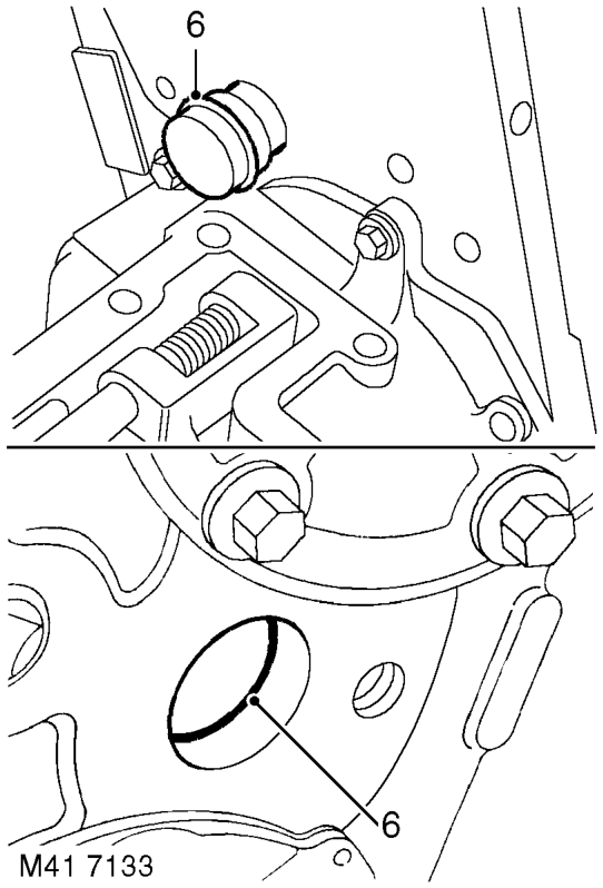 Disassembly – Remove bolt securing intermediate shaft retaining plate, remove plate.