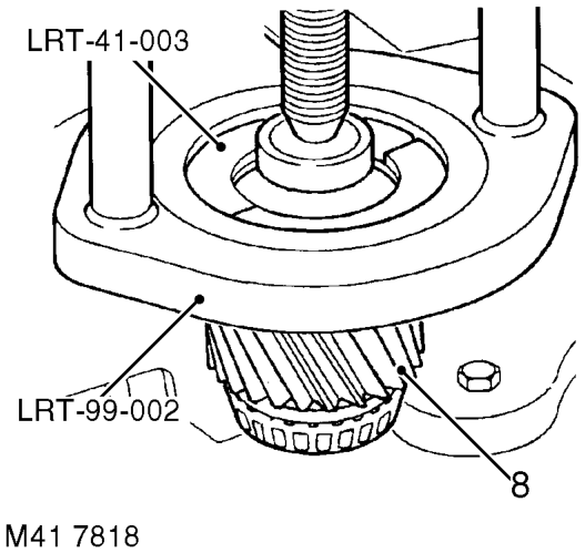 Drift out bearing track from housing and collect selective shim.