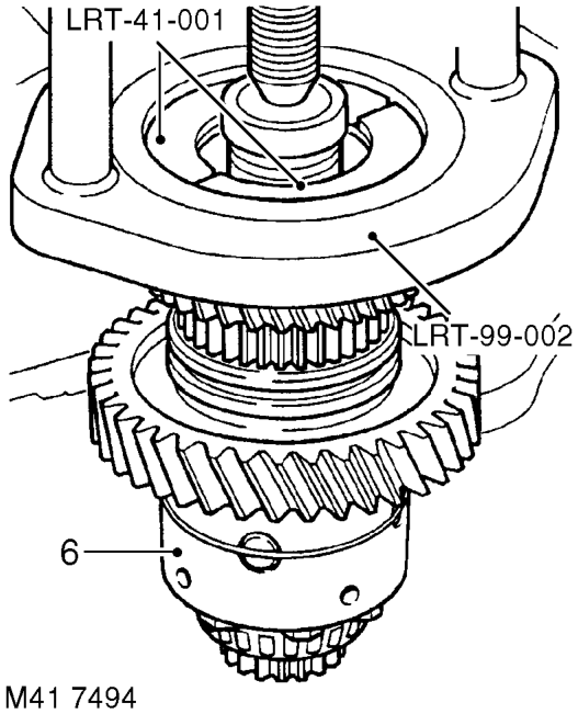 Disassembly – Using tool LRT-41-007 remove and discard bearing retaining nut.
