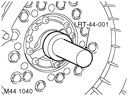 Lubricate oil seal with transmission fluid.