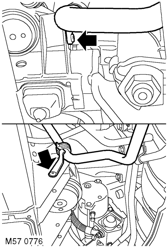 Remove bolt securing coolant rail.