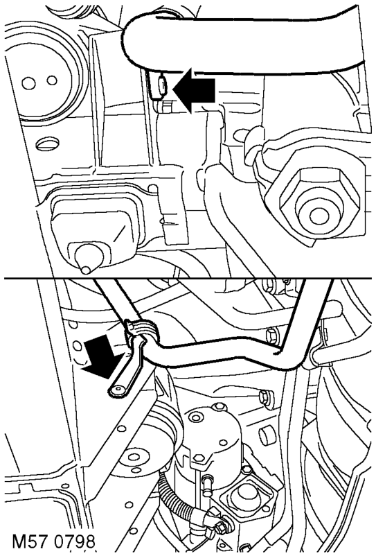 Remove bolt securing coolant rail.