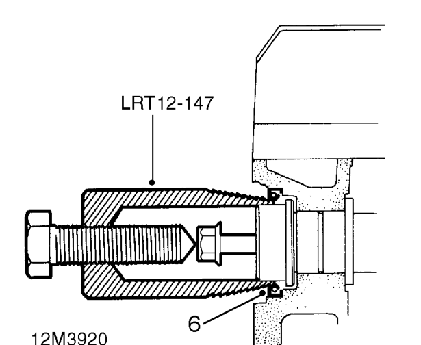 Seal - rear - exhaust camshaft – Remove 2 bolts securing coil bracket, release coil and position aside.