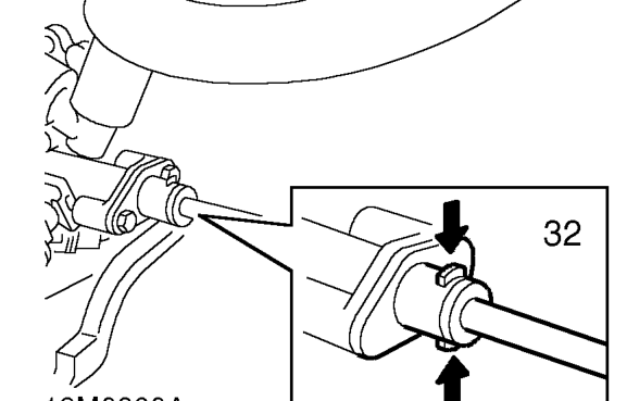 Position absorbent cloth around fuel feed pipe connection to collect spillage.