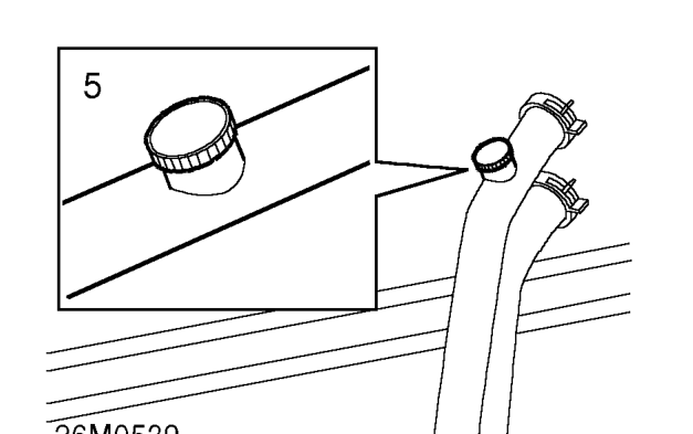 Drain. – Remove bleed screw at coolant rail.