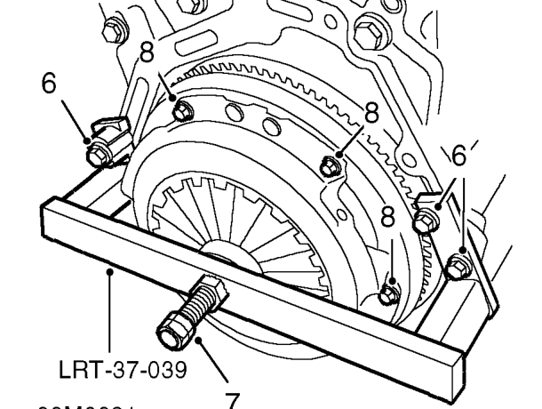 Smear clutch drive plate splines with Molybdenum disulphide grease.