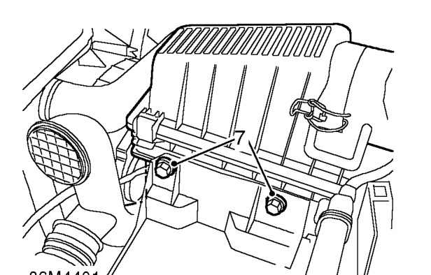 Battery carrier – Release clip securing engine harness to battery carrier.