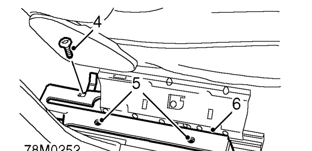 Finisher - seat base - front seat – Remove front carpet retainer.