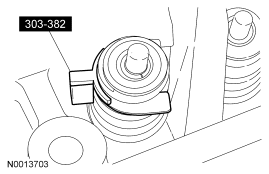 Step 39: Install the special tool between the valve spring coils to prevent valve stem seal damage.