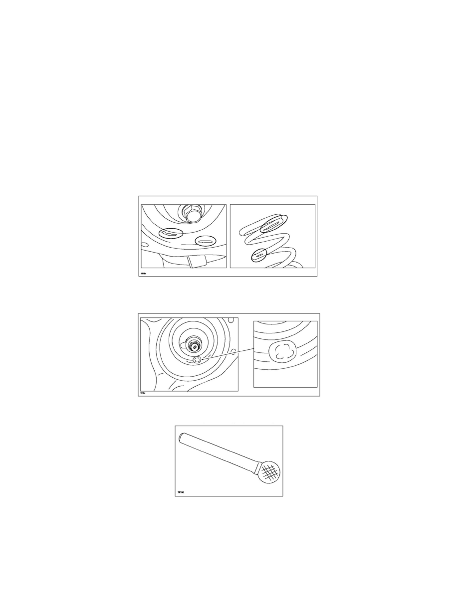 Mazda 3 Service Manual: Rear Coil Spring RemovalInstallation Mazda 3 Service Manual: Rear Coil Spring RemovalInstallation