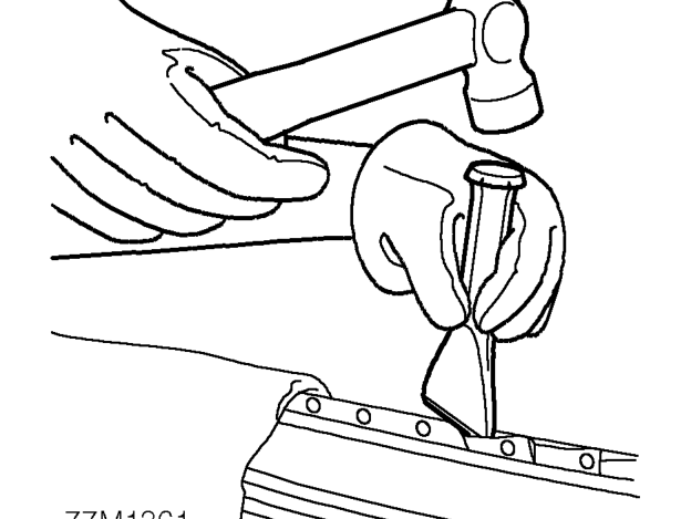 Cut away the bulk of the panel as necessary using an air saw.